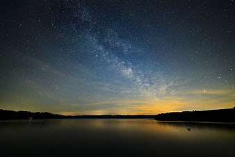 Milky Way Galaxy Over Calm Lake at Night