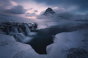 Snowy Kirkjufell Mountain and Waterfall in Iceland