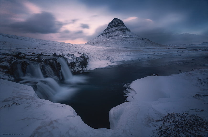 Snowy Kirkjufell Mountain and Waterfall in Iceland