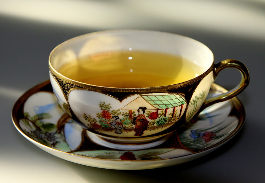 Vintage Japanese Tea Cup with Gold Rim and Traditional Scene