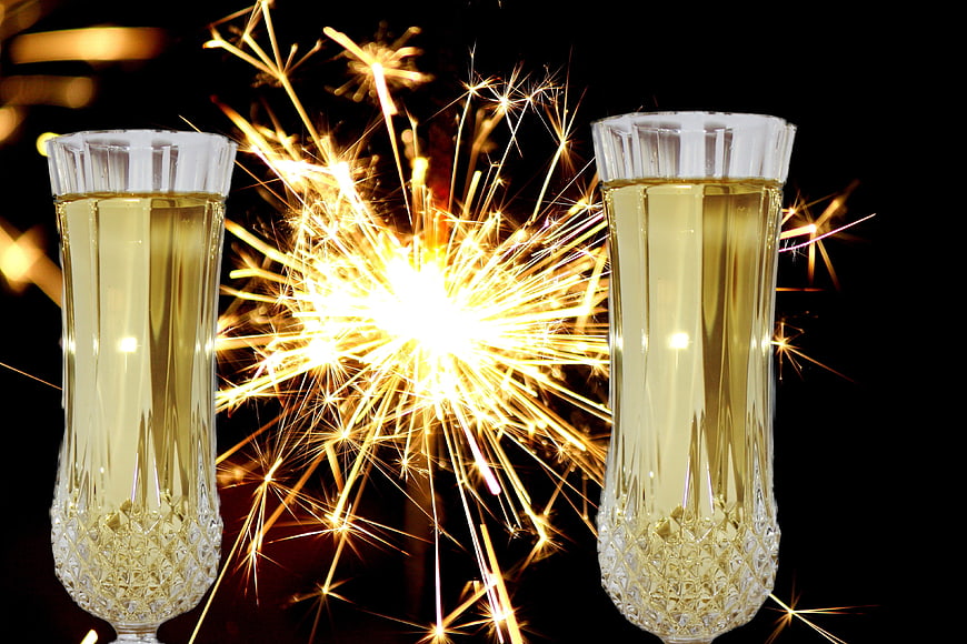 Champagne Glasses with Sparkler for New Year Celebration