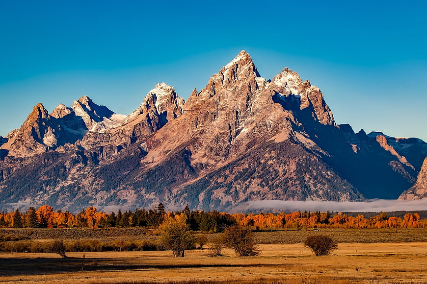 Grand Teton Mountain Range with Autumn Aspen Trees