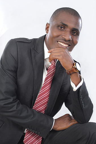 Professional Portrait of Smiling African American Man in Suit