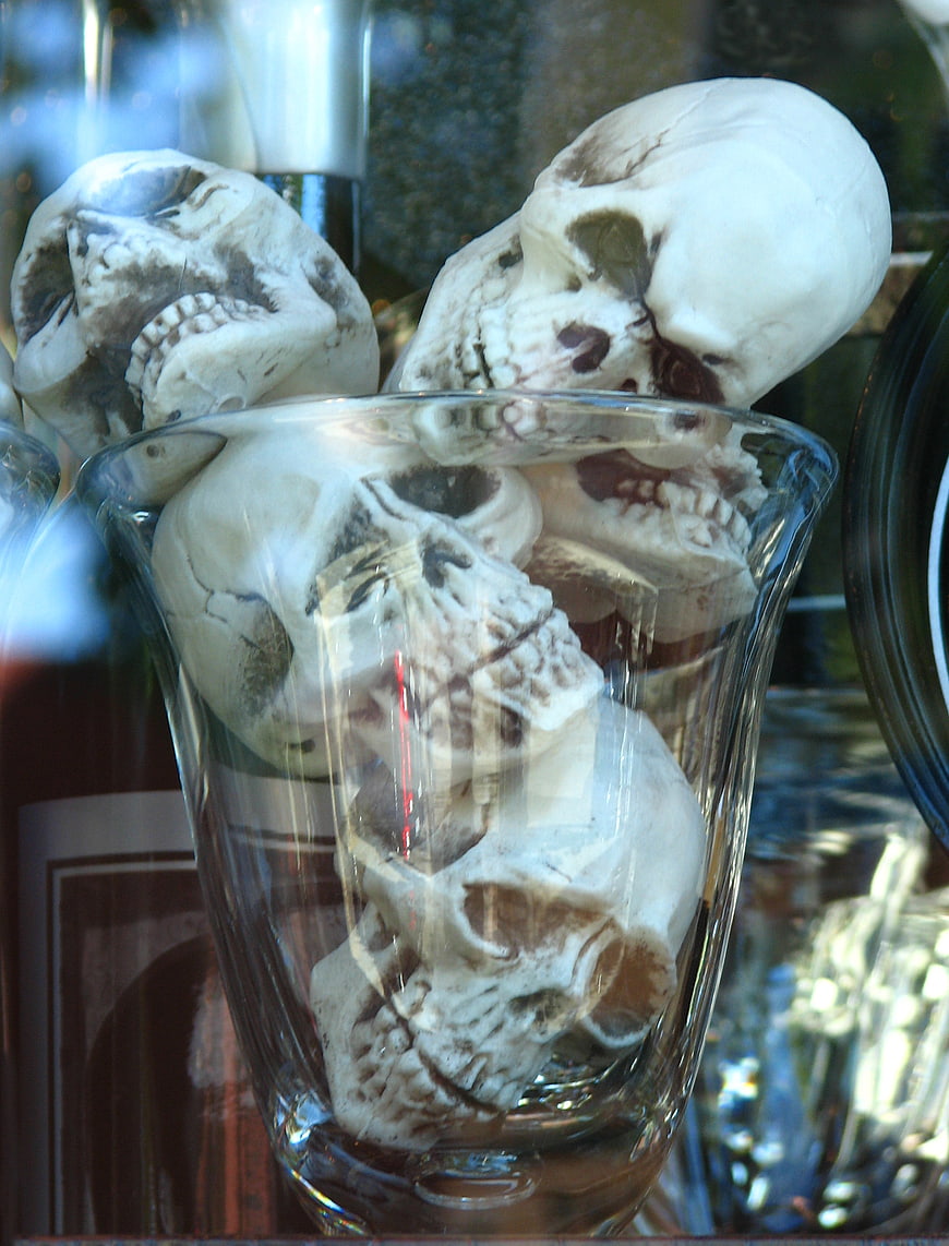 Miniature skulls in a glass for Halloween decoration