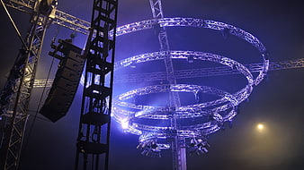 Blue LED stage lighting truss structure at night