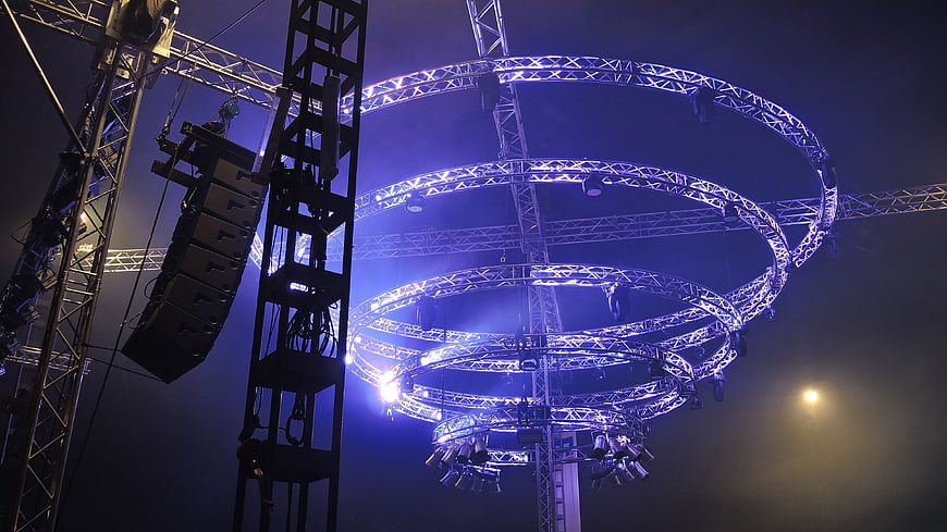 Blue LED stage lighting truss structure at night