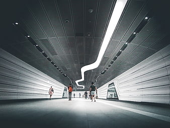 Modern Futuristic Tunnel with People Walking