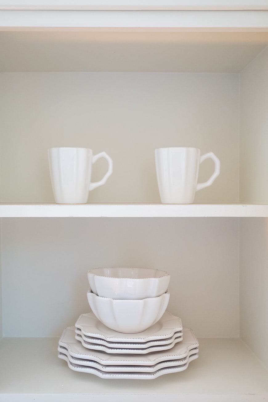 Minimalist White Ceramic Tableware on Open Kitchen Shelves