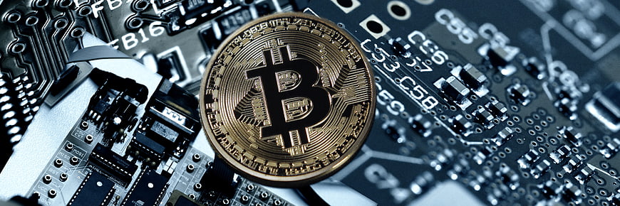 Golden Bitcoin on Circuit Board Background
