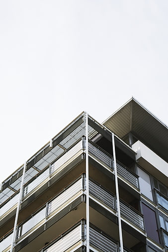 Low angle view of modern apartment building with balconies