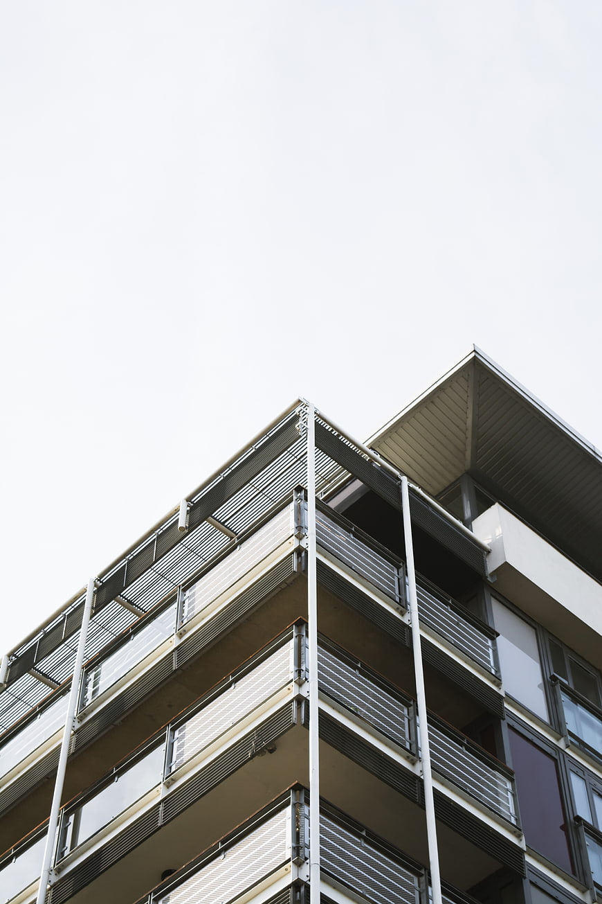 Low angle view of modern apartment building with balconies