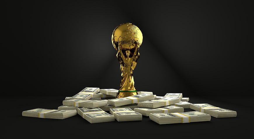 Golden World Cup Trophy Surrounded By Stacks Of Cash On Black Background