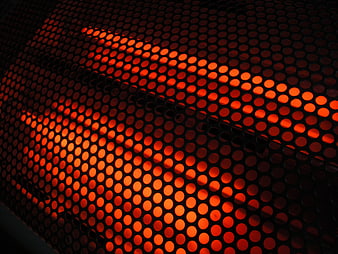 Abstract Glowing Red Perforated Metal Grid Pattern