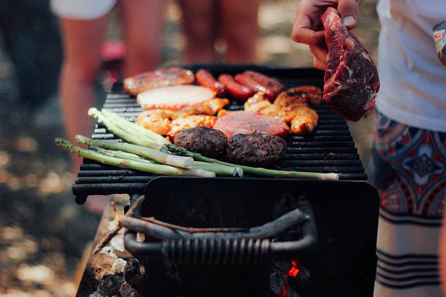 Close-up of Grilling Meat and Vegetables on Charcoal BBQ