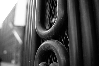 Close-up of black metal bike rack loops