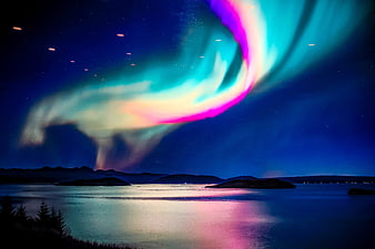 Vibrant Aurora Borealis Over Icelandic Water Landscape
