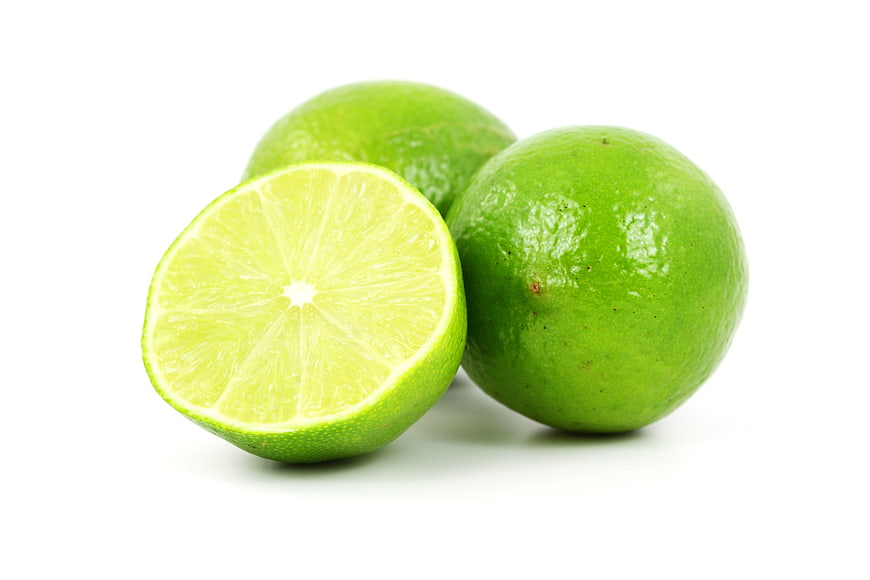 Fresh Green Limes Isolated on White Background