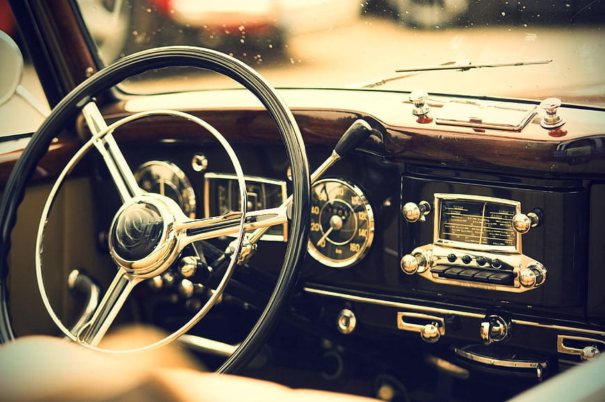 Vintage Classic Car Interior Dashboard and Steering Wheel