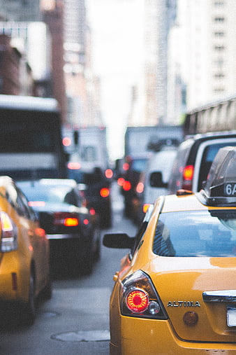 Yellow Taxi in City Traffic Congestion