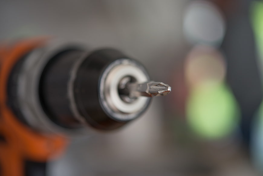Close-up of electric screwdriver bit in drill chuck