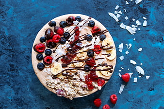 Top View of Healthy Smoothie Bowl with Berries and Banana
