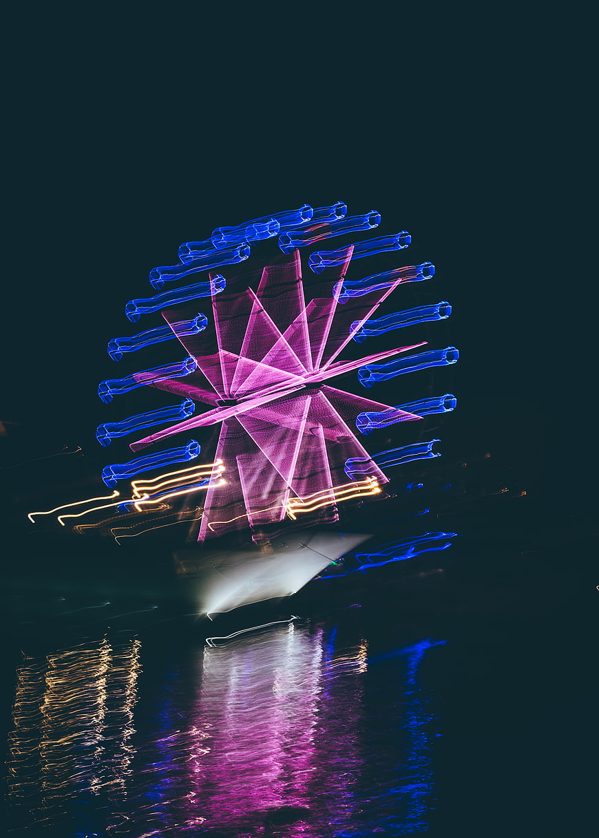 Abstract Light Painting of Ferris Wheel at Night