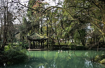 Traditional Chinese Pavilion in Serene Garden Pond