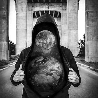 Hooded figure revealing universe with Earth and Moon inside jacket