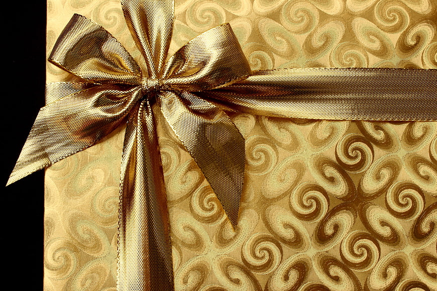 Gold Gift Box with Ribbon and Swirl Pattern