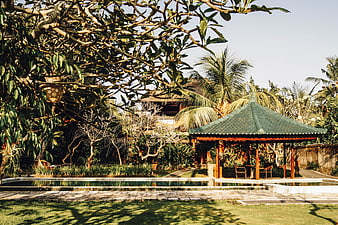 Tropical Bali Villa Pool with Traditional Gazebo and Lush Garden