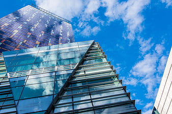 Modern Glass Skyscrapers Against Blue Sky