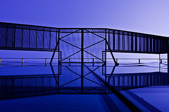 Abstract Blue Metal Fence Structure with Reflection