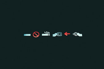 Airplane seatbelt and no smoking signs illuminated in dark cabin