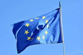 European Union Flag Waving Against Clear Blue Sky