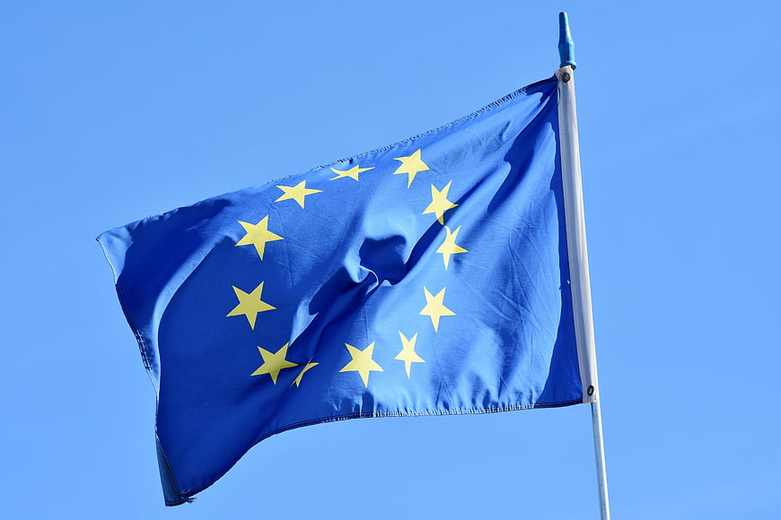 European Union Flag Waving Against Clear Blue Sky