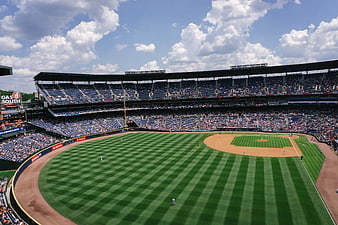 Wide angle view of baseball stadium field and grandstands