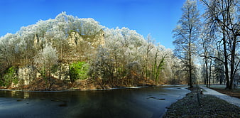 Frosted trees and frozen river in Choceň winter landscape