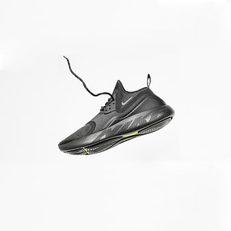 Black Nike Running Shoe Floating on White Background