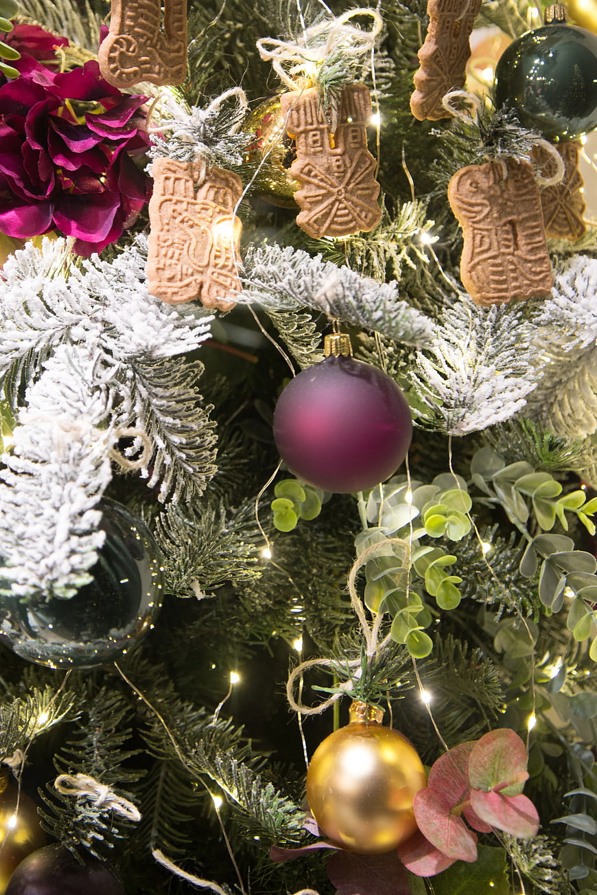 Frosted Christmas Tree with Gingerbread Ornaments and Baubles