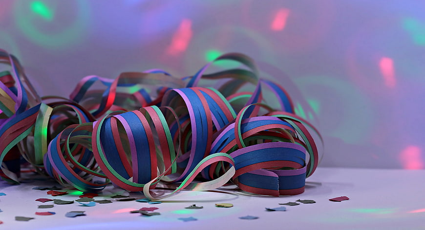 Colorful Party Streamers And Confetti With Neon Lighting