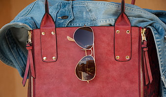 Red Leather Handbag With Sunglasses And Denim Jacket