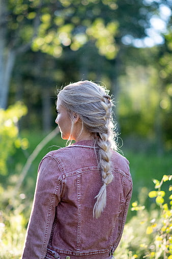 Blonde Woman with Braid in Pink Denim Jacket Outdoors