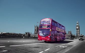 Red Double-Decker Bus Driving Past Big Ben In London