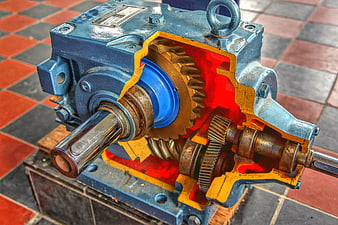 Cutaway view of industrial gearbox with internal gears