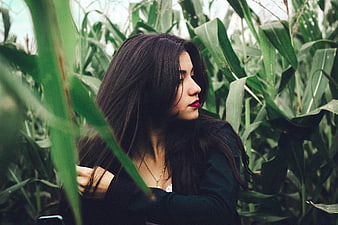Woman with Red Lipstick in Cornfield