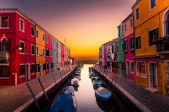 Colorful Burano Island Canal at Sunset with Parked Boats