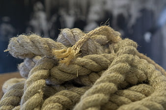 Close-up of thick twisted natural fiber rope texture