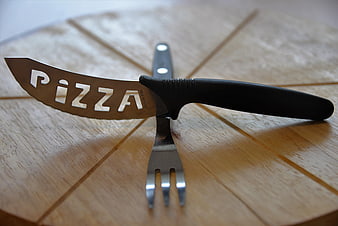 Pizza Knife and Fork on Wooden Board