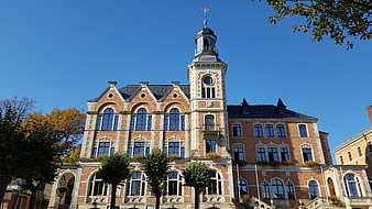 Historic Brick Town Hall Building with Clock Tower