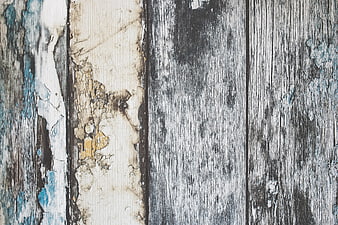 Weathered Wooden Planks with Peeling Blue and White Paint